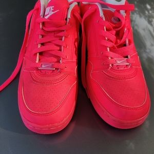 Hot pink Nike sneakers